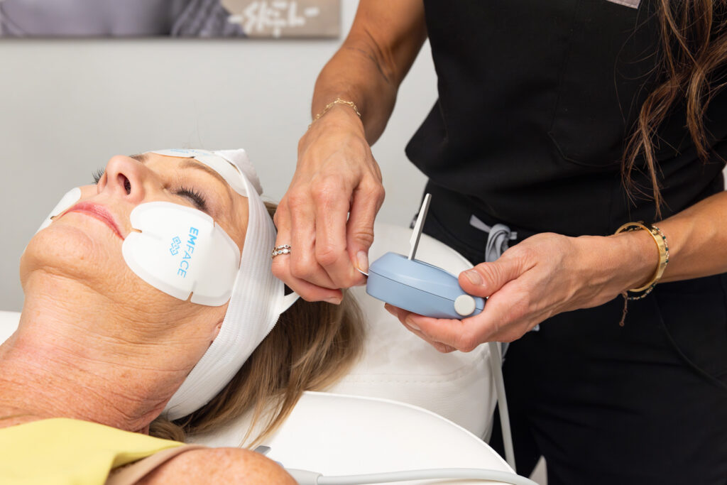 Woman relaxes during treatment of EMFACE in South Pasadena, FL